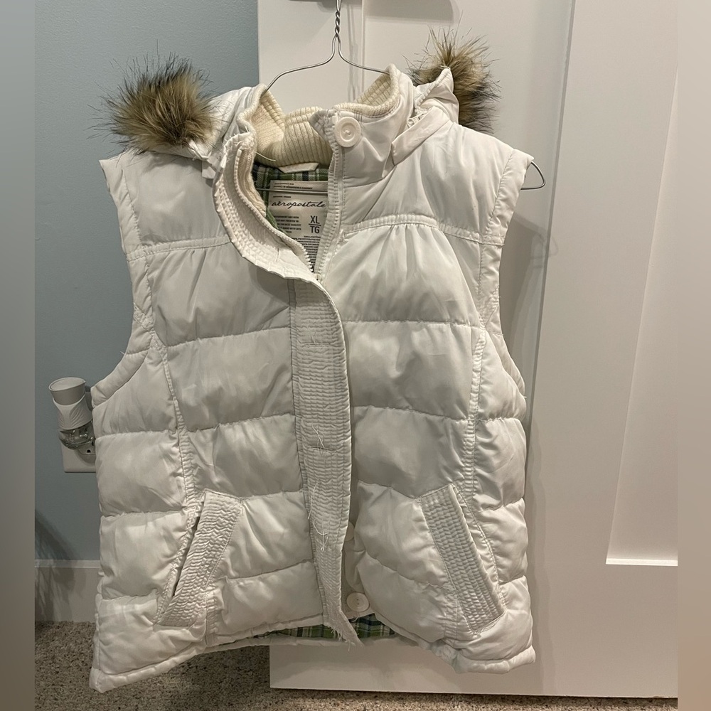 white vest with hood